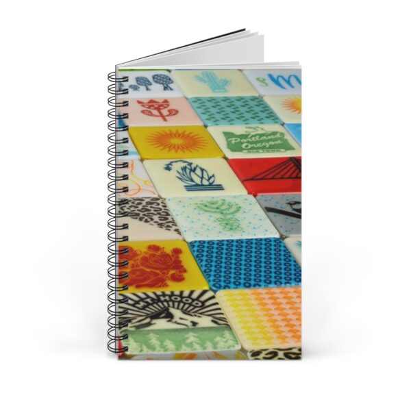 Powder printed glass tiles on notebook