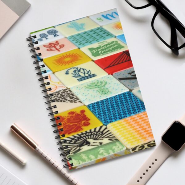 Powder printed glass tiles on notebook